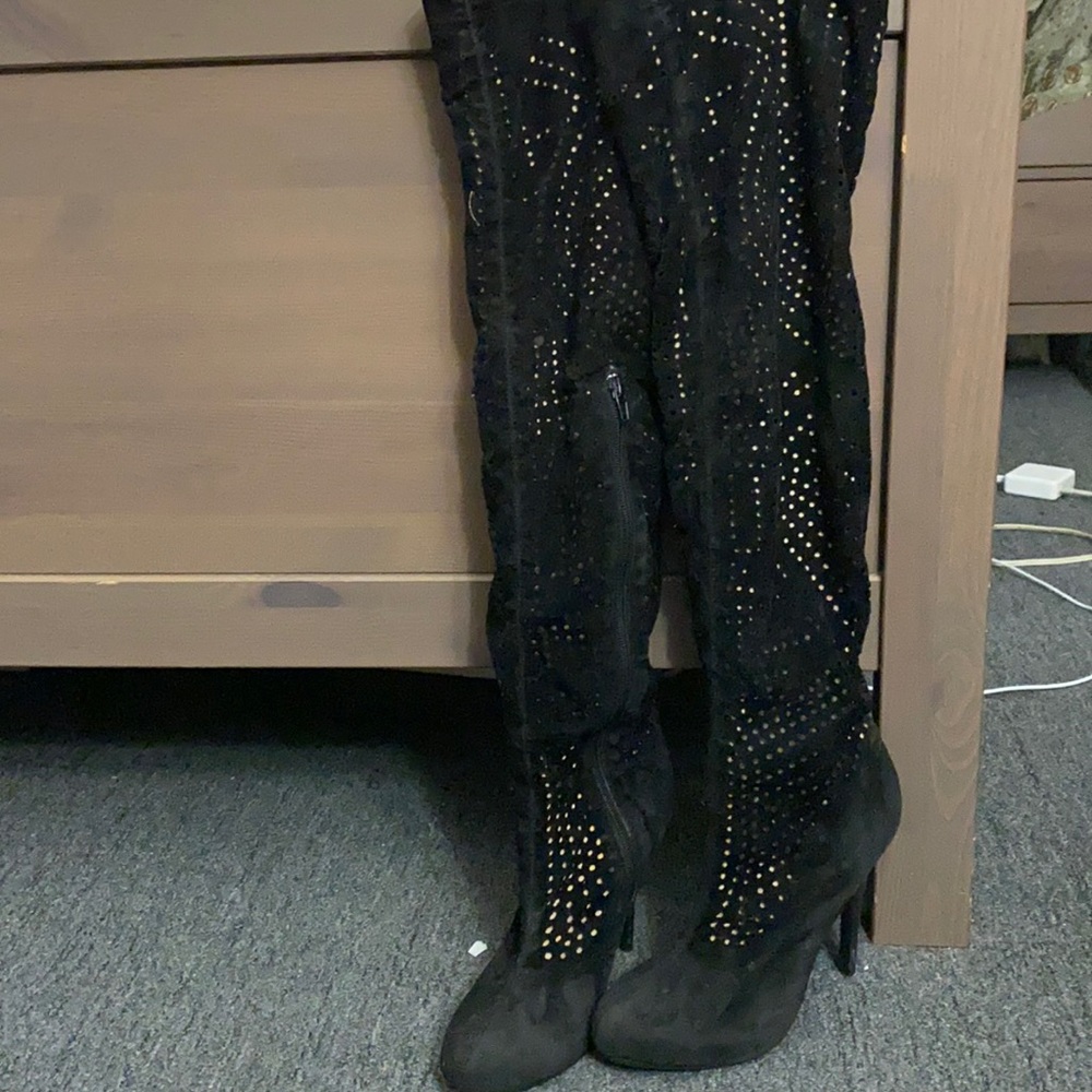Long black heeled boots